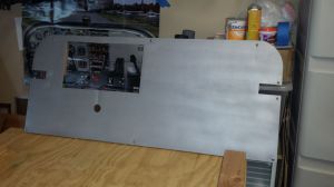 Panel when covered with Polywall and painted metallic grey to look a bit like aluminum